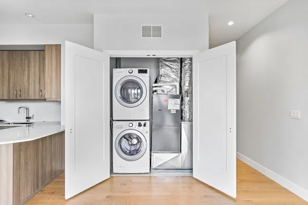a utility room with dryer and washer