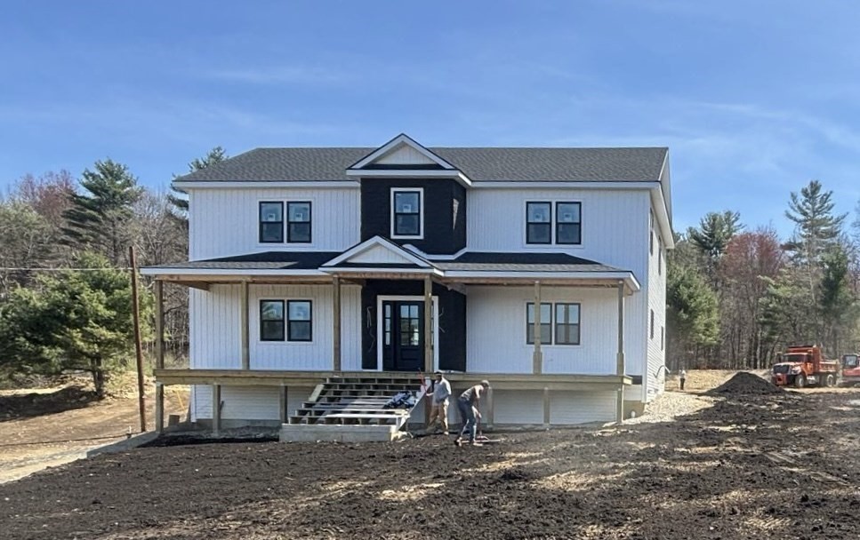 4 Eagleton Street Spencer, MA 01562 - Photo 9 of 11 a front view of a house with a yard