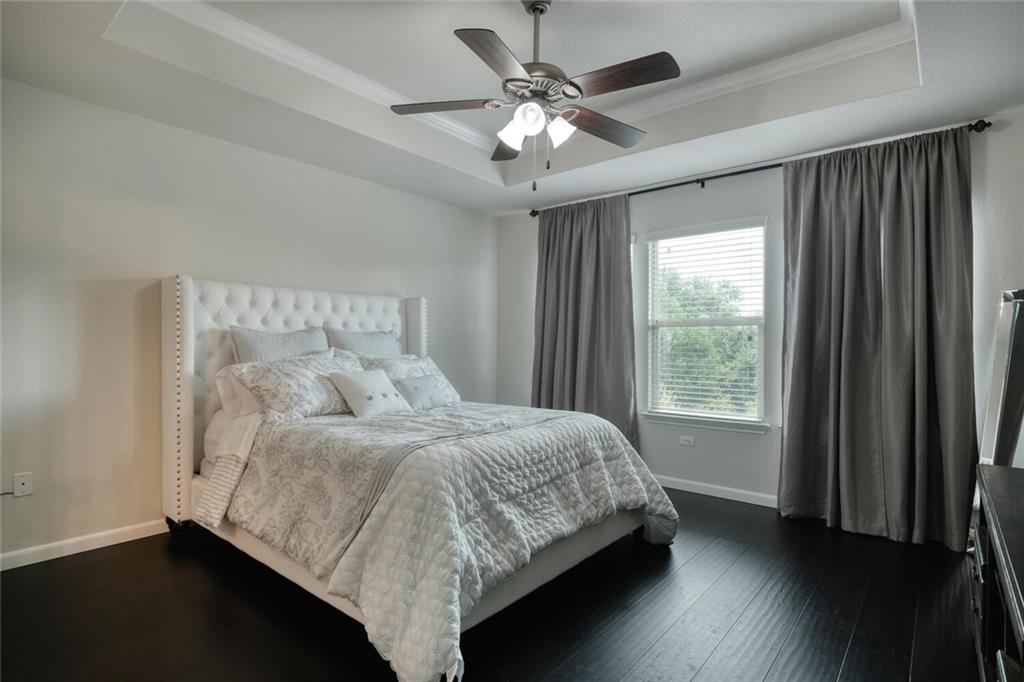 10053 Aly May Drive Austin, TX 78748 - Photo 11 of 15 a bedroom with a bed and a window
