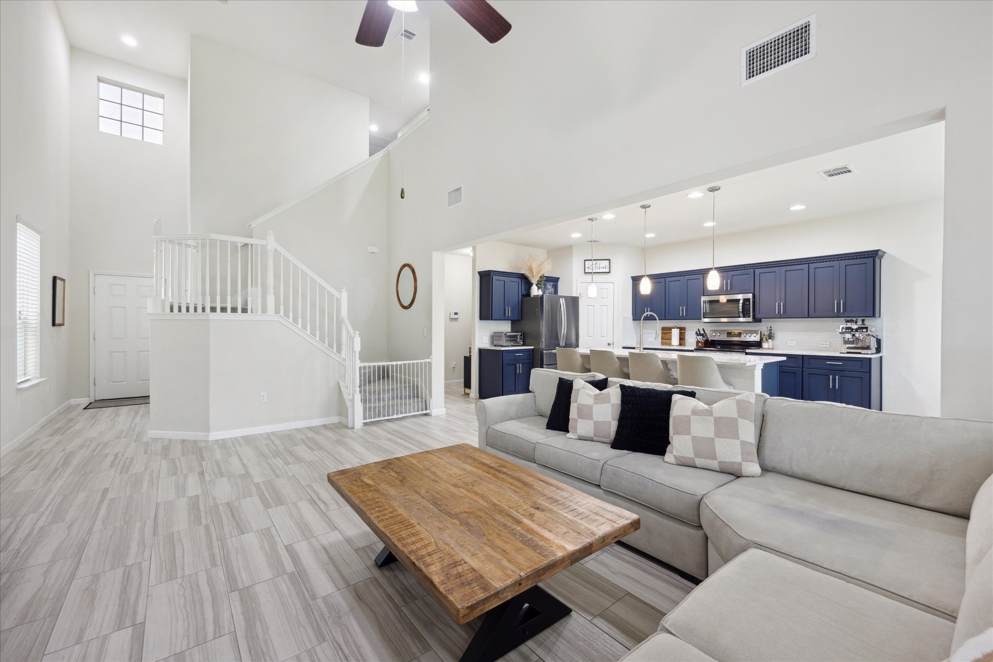 10053 Aly May Drive Austin, TX 78748 - Photo 3 of 15 a living room with furniture and a wooden floor