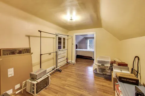 a room with a table and chairs