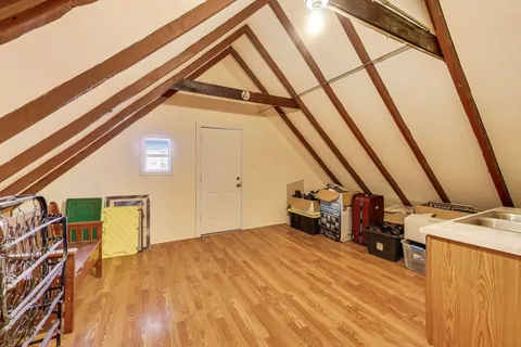 a utility room with sink dryer and washer