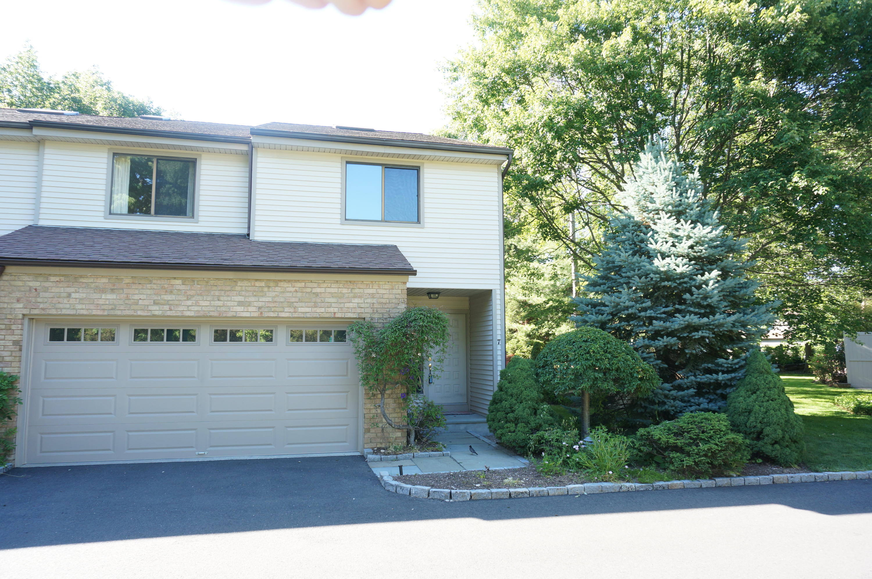 500 River Road, Unit 7 Greenwich, CT 06807 - Photo 1 of 29 a view of outdoor space yard and front view of a house