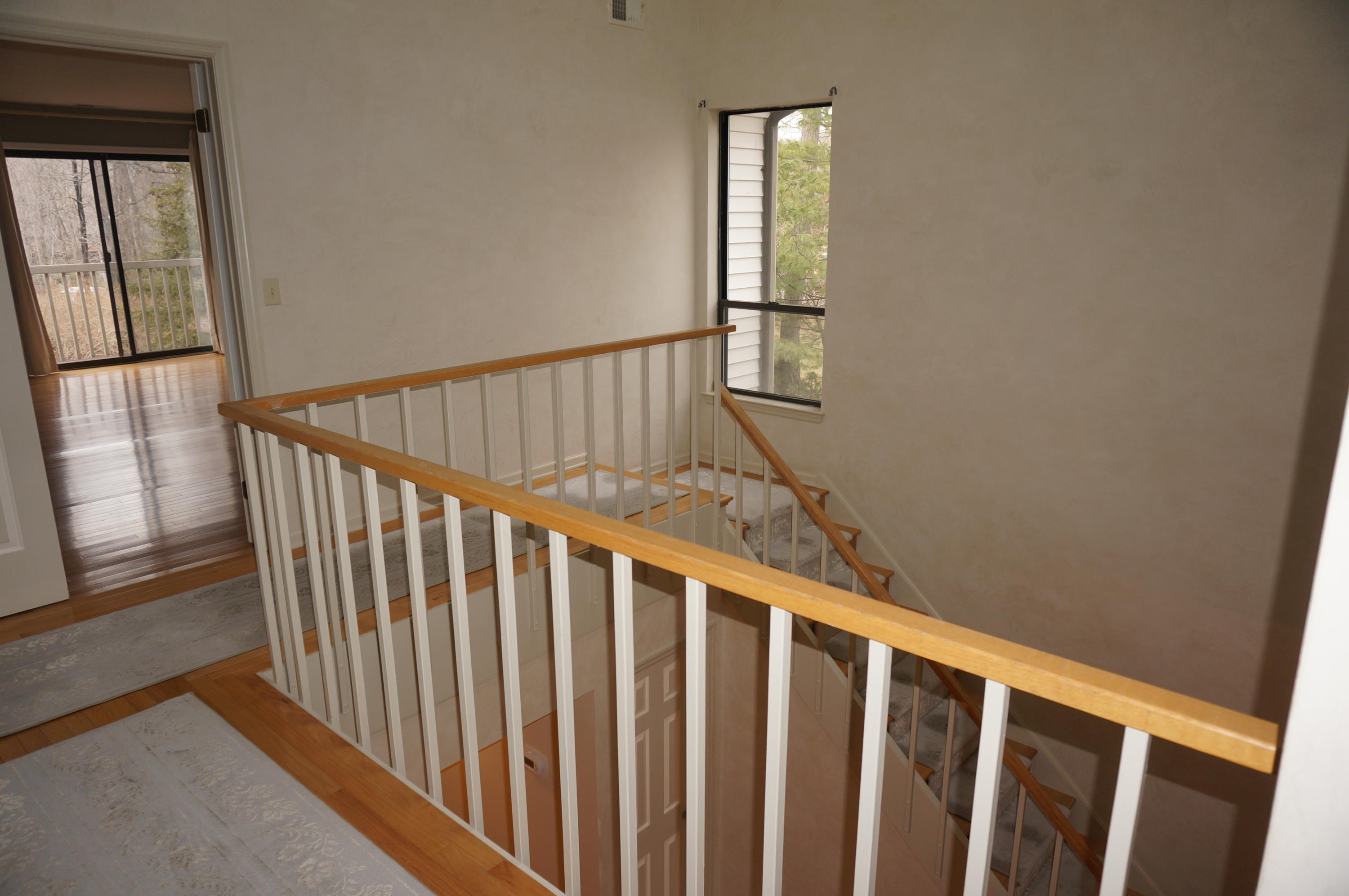 500 River Road, Unit 7 Greenwich, CT 06807 - Photo 13 of 29 a view of staircase with rug floor