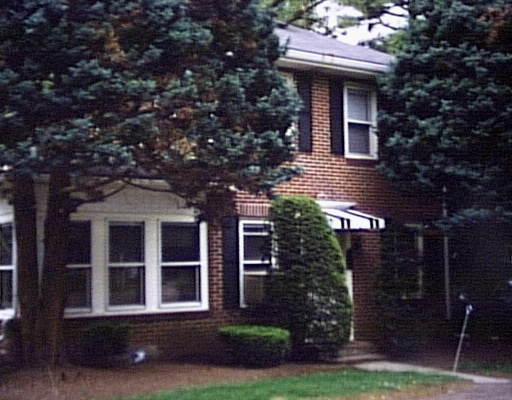 8 Evergreen Road Natick, MA 01760 - Photo 1 of 1 a front view of a house with garden