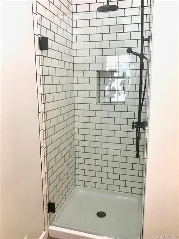 708 Trail Ridge Road Matthews, NC 28105 - Photo 15 of 40 a bathroom with a shower