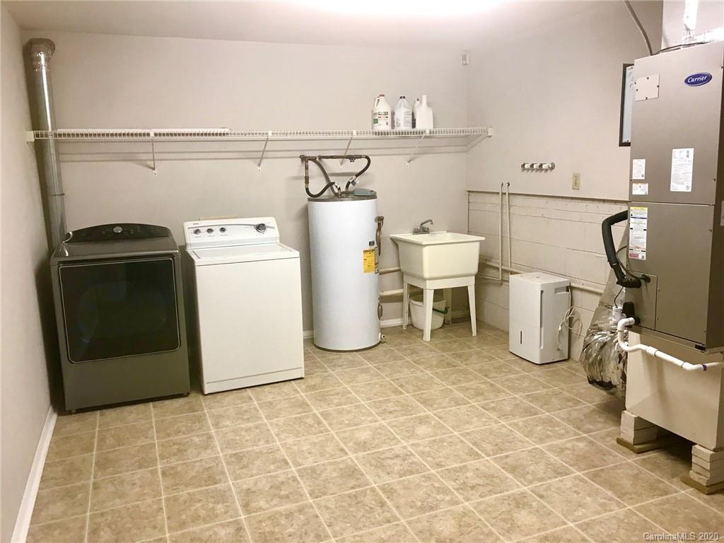 708 Trail Ridge Road Matthews, NC 28105 - Photo 25 of 40 a utility room with dryer and washer