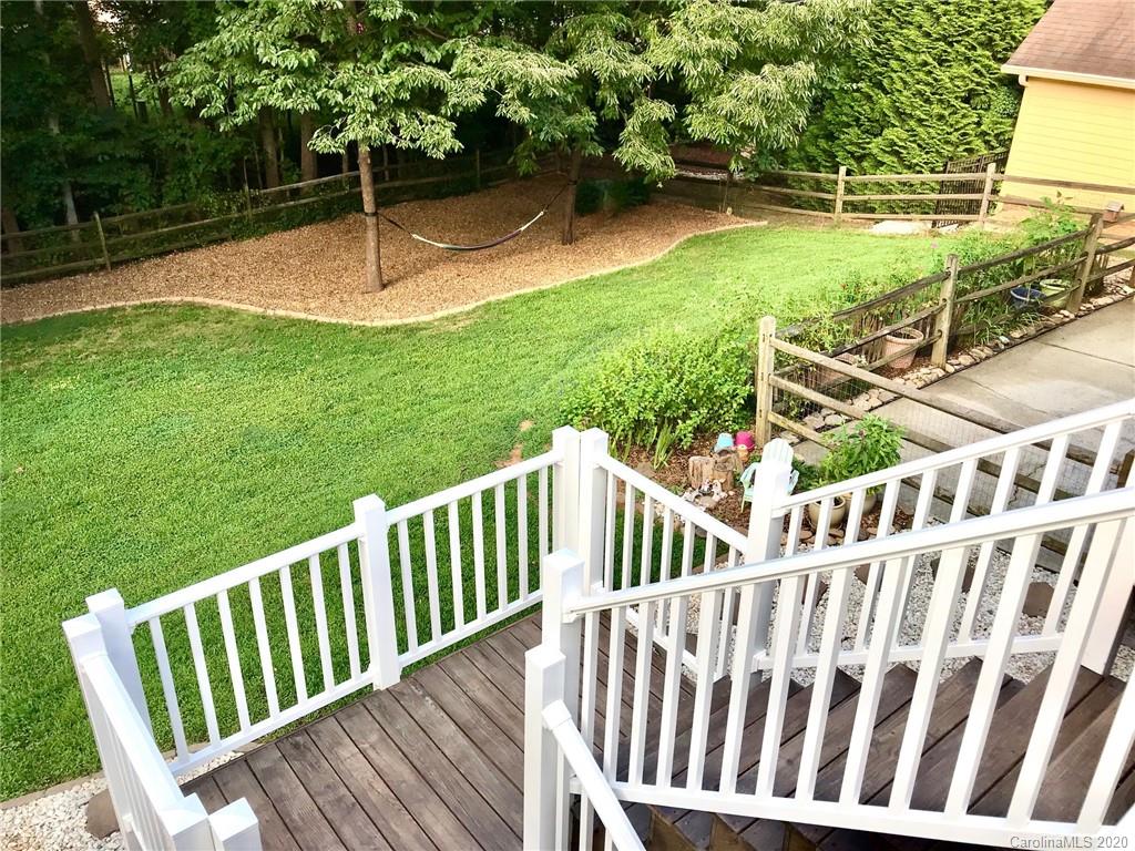 708 Trail Ridge Road Matthews, NC 28105 - Photo 35 of 40 a view of deck with a chair and potted plant