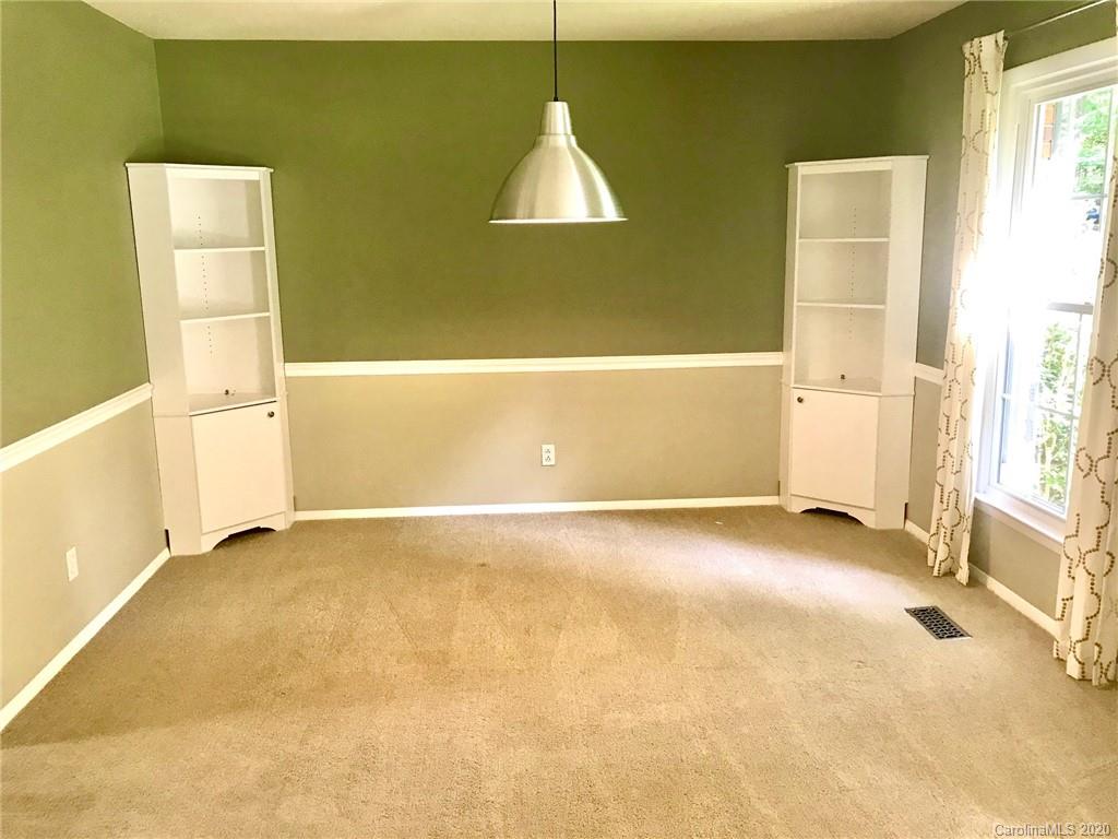 708 Trail Ridge Road Matthews, NC 28105 - Photo 5 of 40 a view of an empty room with a window