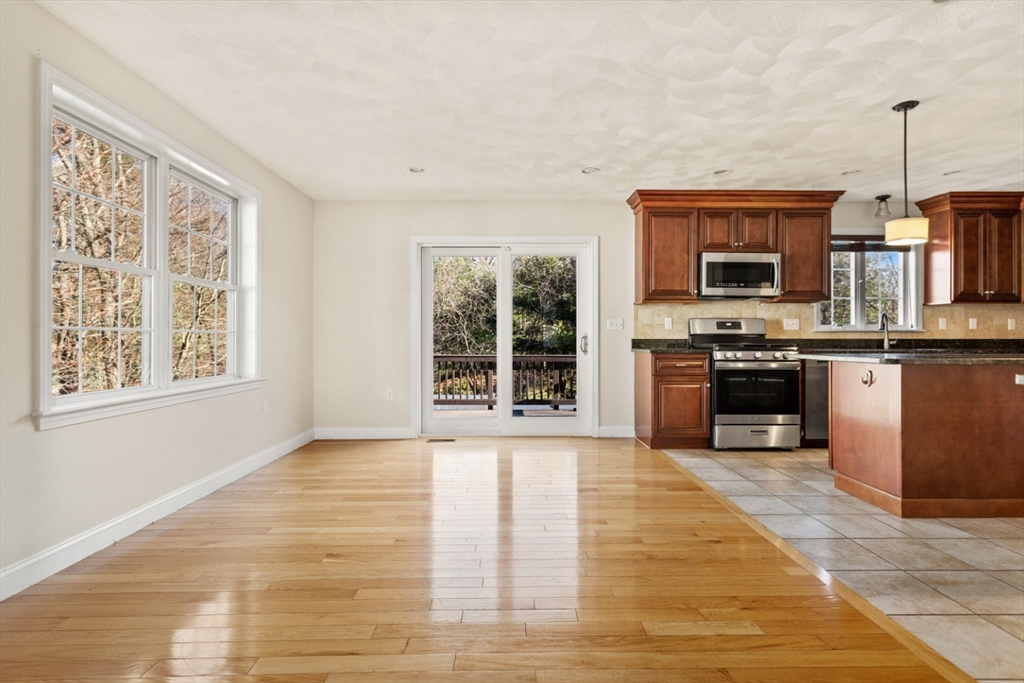 3 Gordon Road North Reading, MA 01864 - Photo 19 of 38 a kitchen with stainless steel appliances granite countertop a stove and a sink