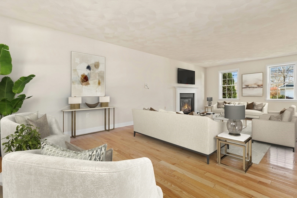 3 Gordon Road North Reading, MA 01864 - Photo 6 of 38 a living room with furniture and a wooden floor