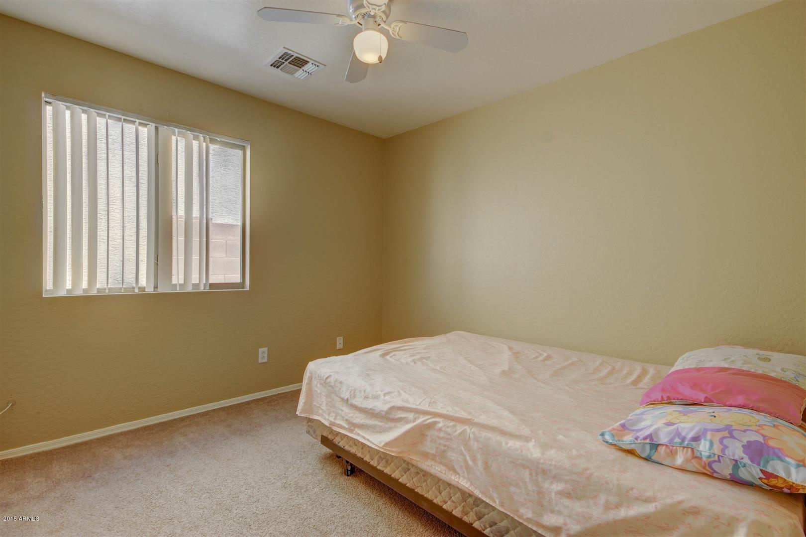 8445 West Riley Road Tolleson, AZ 85353 - Photo 16 of 23 Bedroom 3