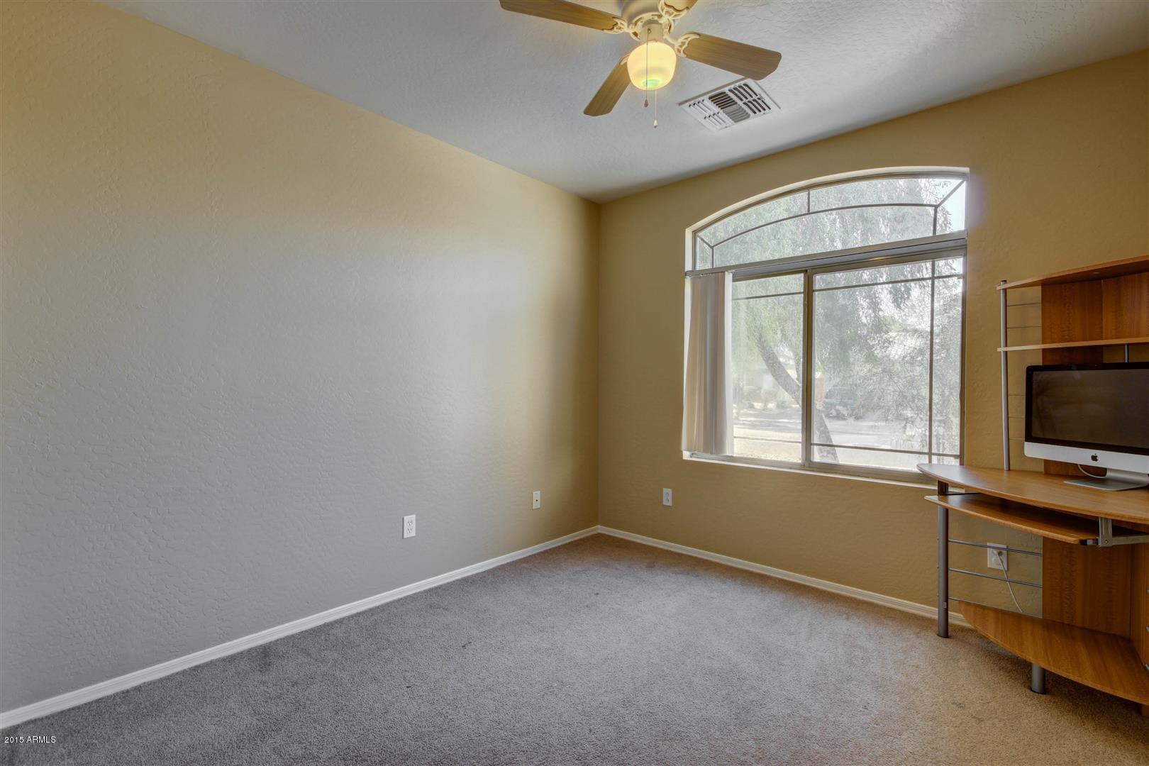 8445 West Riley Road Tolleson, AZ 85353 - Photo 18 of 23 Bedroom 4