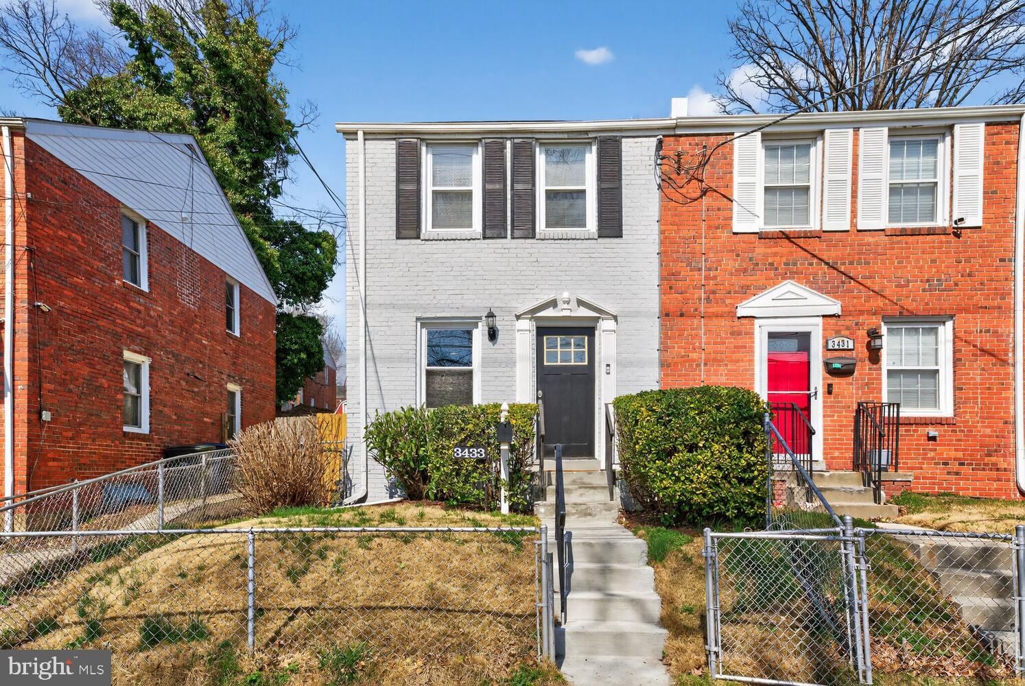 3433 25th Street Southeast Washington, DC 20020 - Photo 1 of 26 a front view of a house with garden