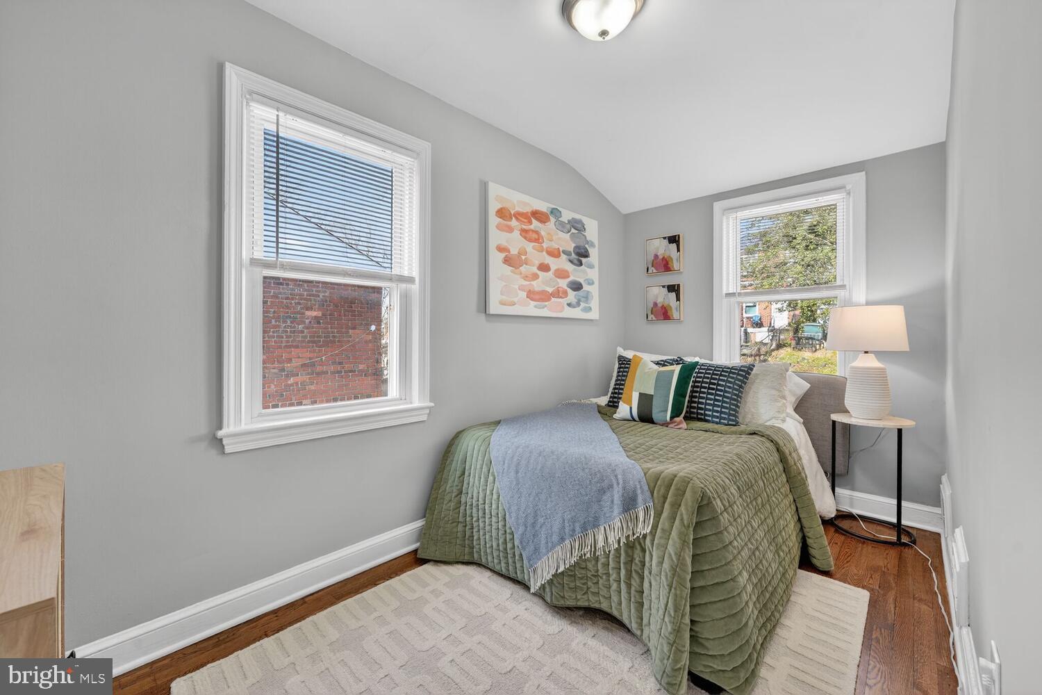 3433 25th Street Southeast Washington, DC 20020 - Photo 11 of 26 a bedroom with a bed and a window