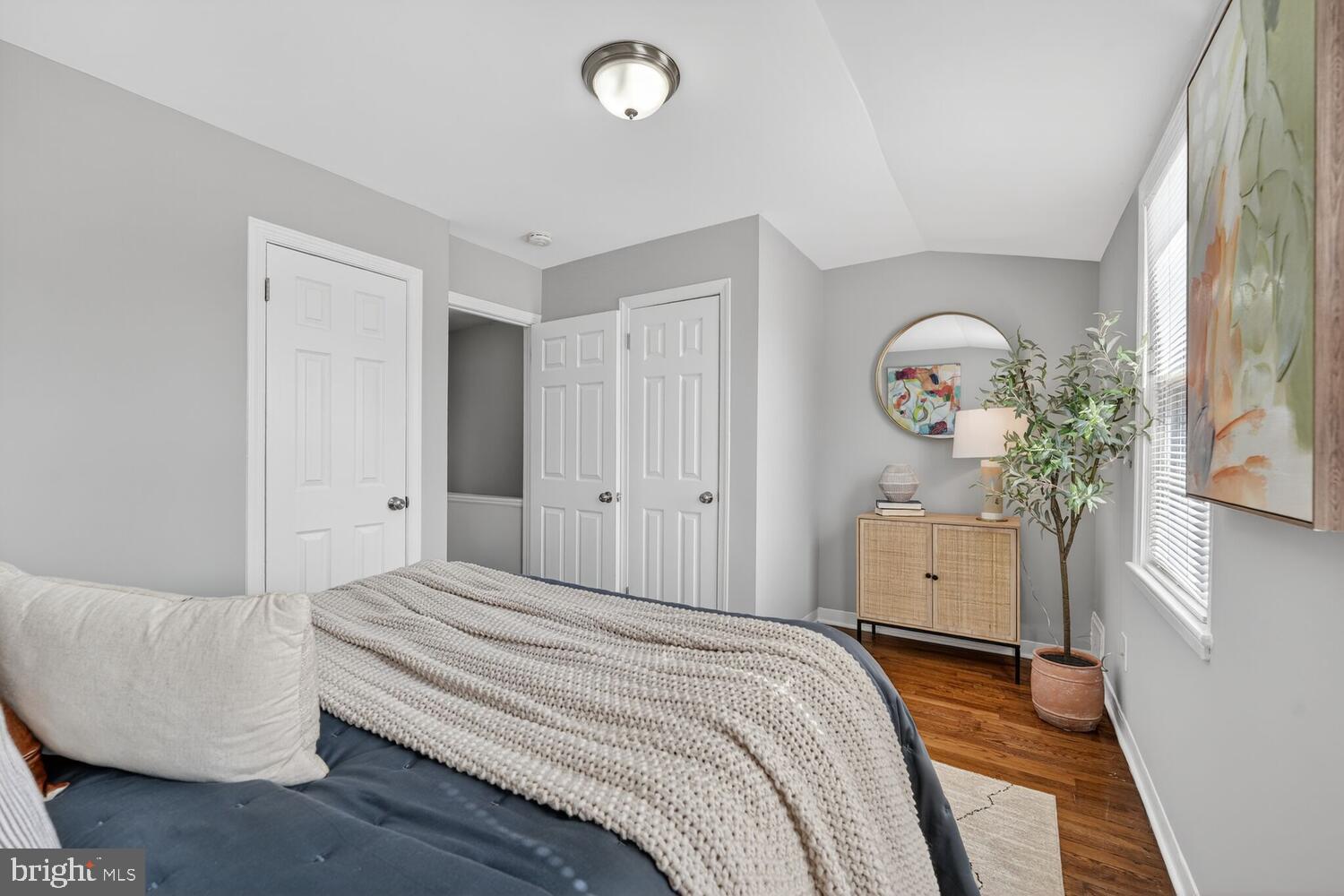 3433 25th Street Southeast Washington, DC 20020 - Photo 15 of 26 a bedroom with a bed and a window