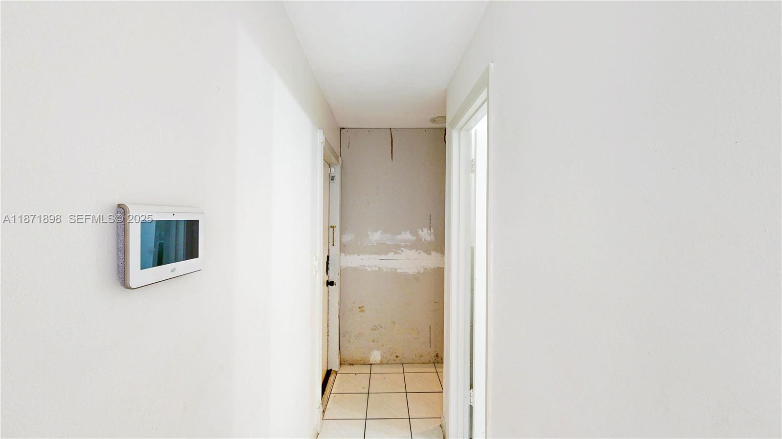 15166 Southwest 94th Terrace Miami, FL 33196 - Photo 29 of 83 a bathroom with a glass shower door