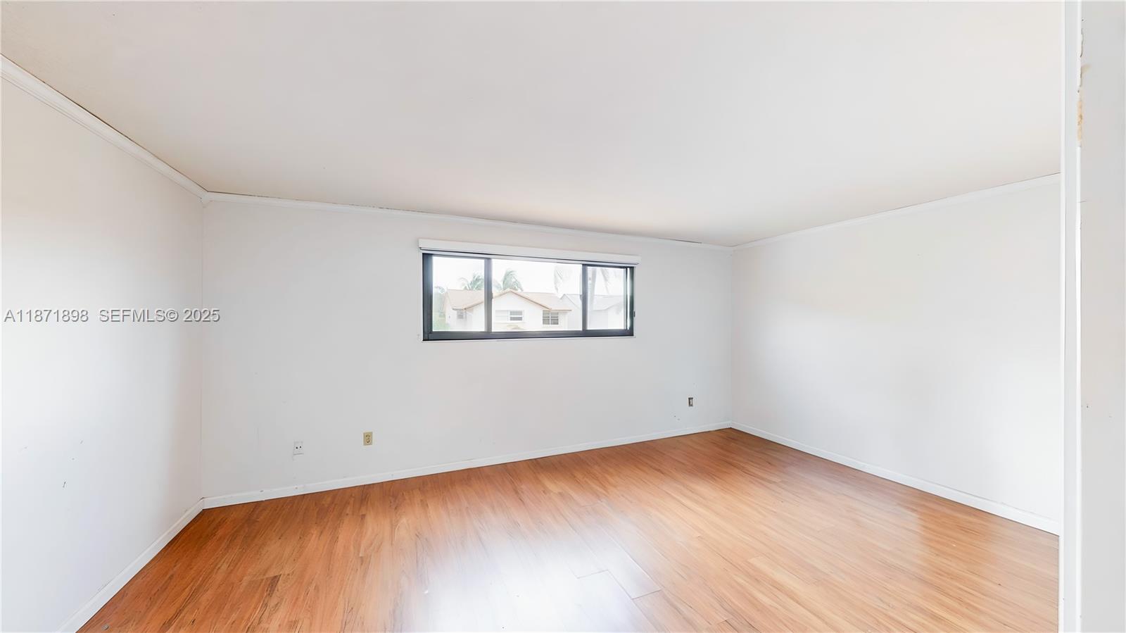 15166 Southwest 94th Terrace Miami, FL 33196 - Photo 35 of 83 an empty room with a window