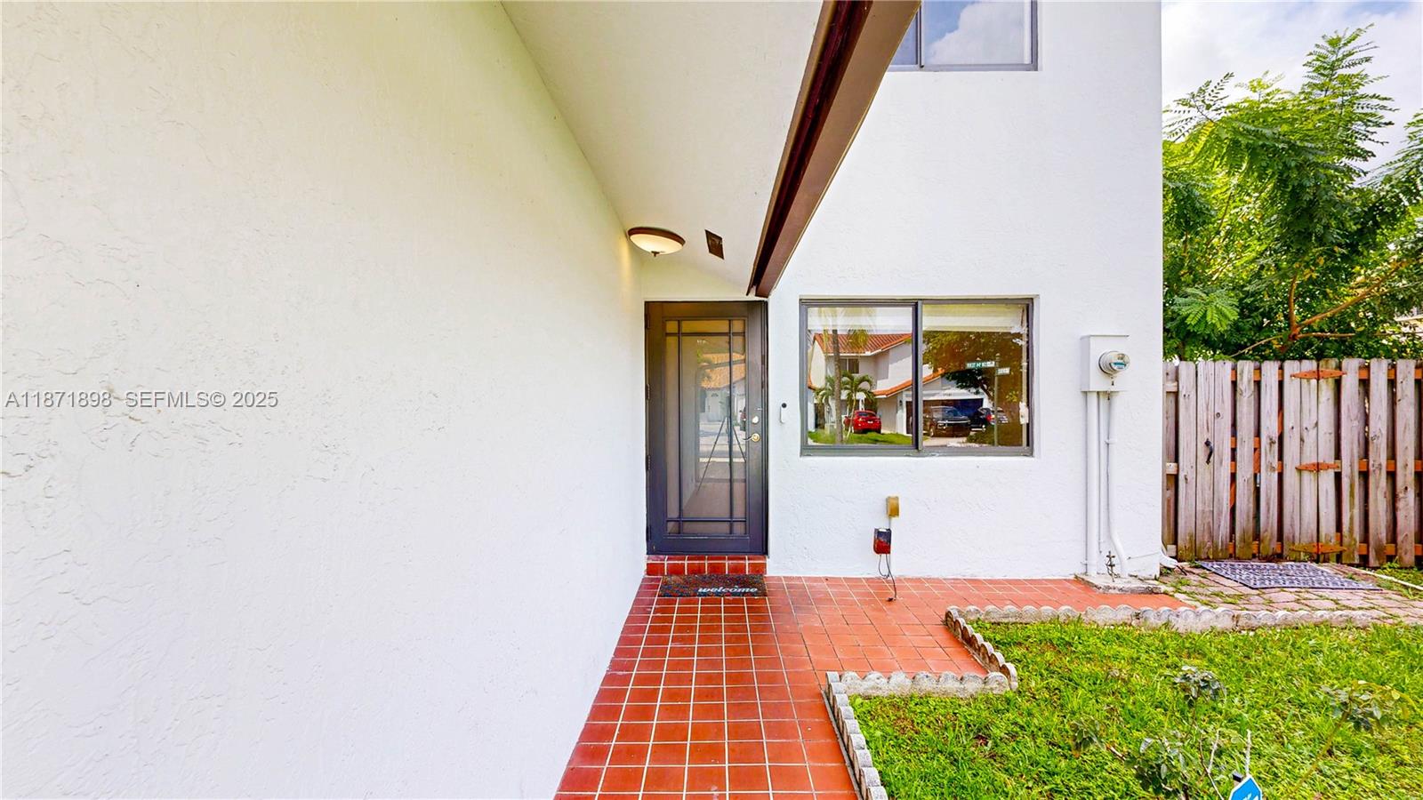 15166 Southwest 94th Terrace Miami, FL 33196 - Photo 4 of 83 a view of front door of house