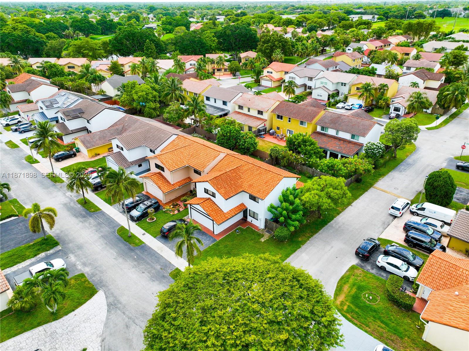 15166 Southwest 94th Terrace Miami, FL 33196 - Photo 73 of 83 an aerial view of residential houses with outdoor space and street view