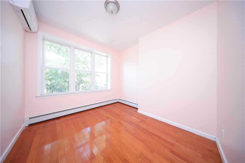 522 81 Street Brooklyn, NY 11209 - Photo 15 of 42 an empty room with a window
