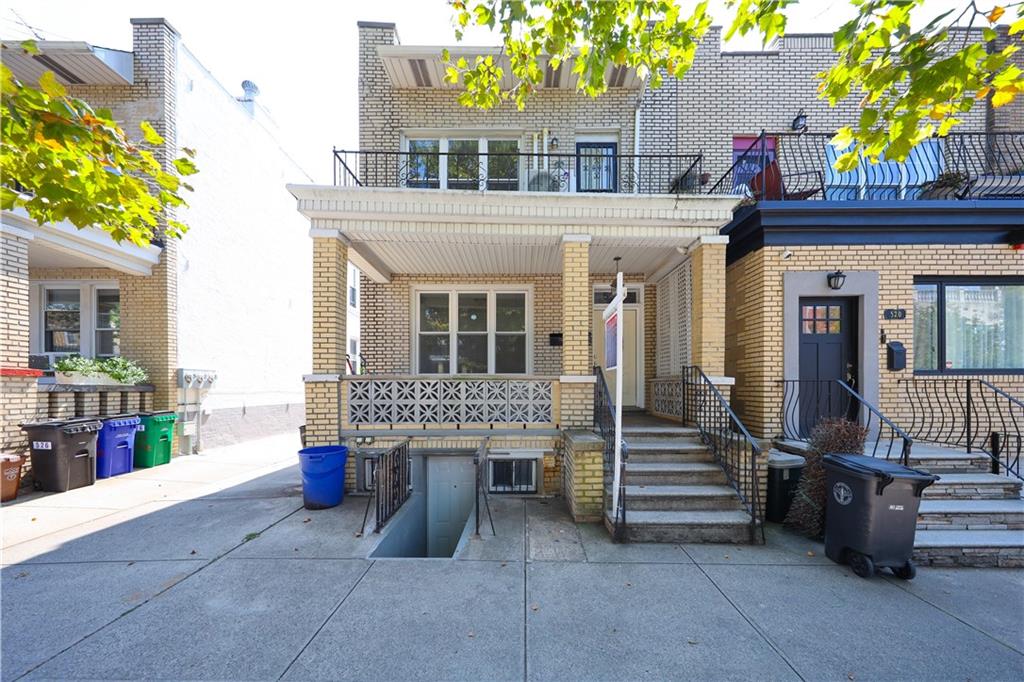 522 81 Street Brooklyn, NY 11209 - Photo 2 of 42 a front view of a house with a porch
