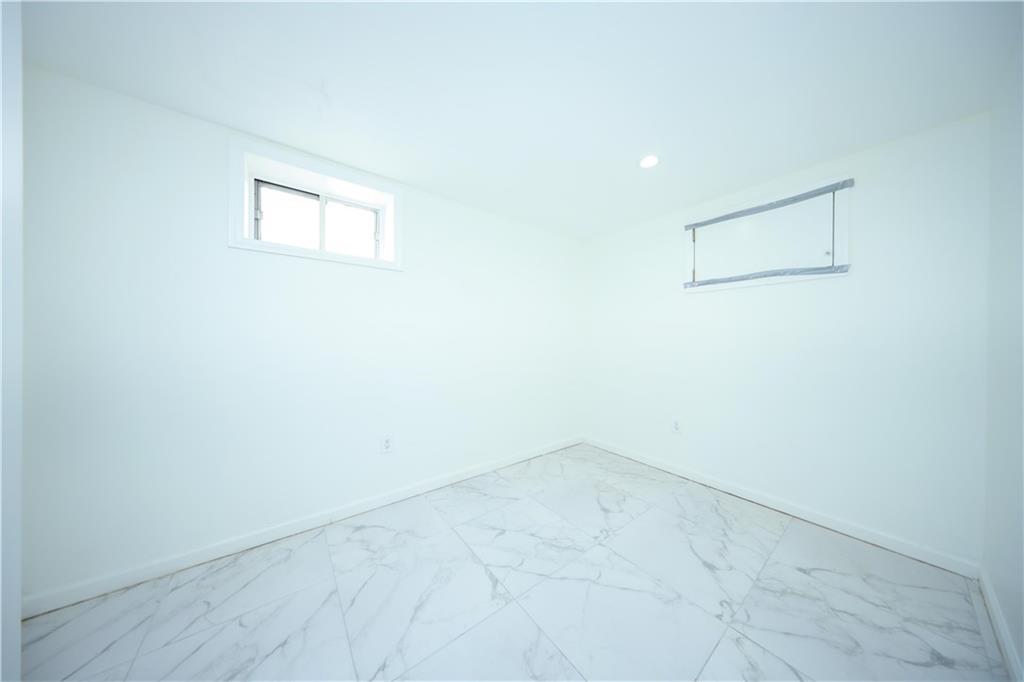 522 81 Street Brooklyn, NY 11209 - Photo 27 of 42 an empty room with a empty space and window
