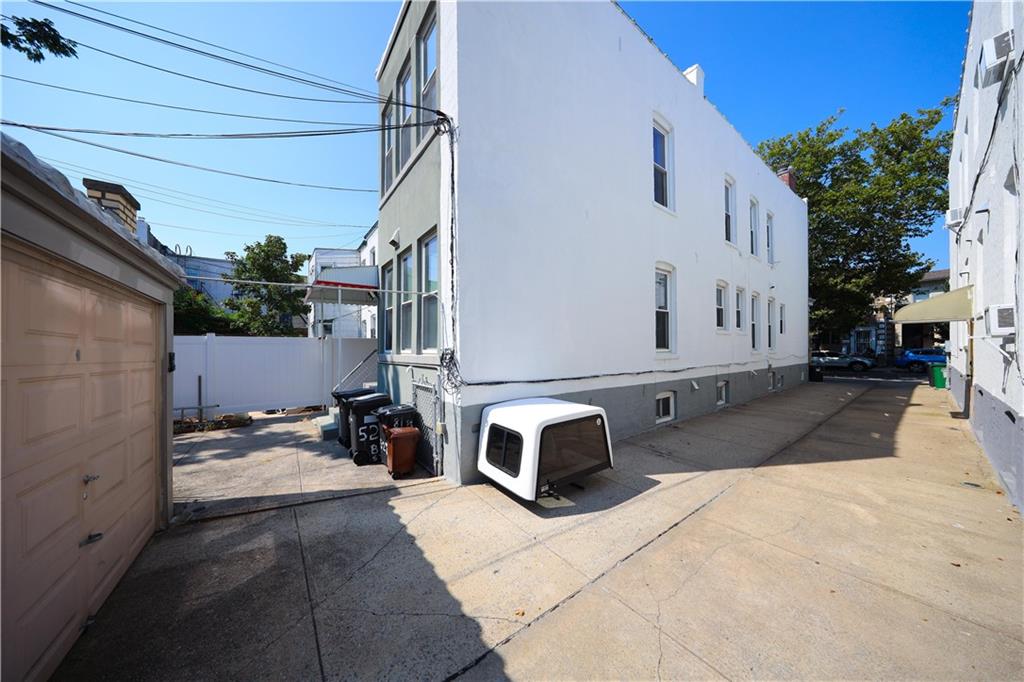 522 81 Street Brooklyn, NY 11209 - Photo 3 of 42 a view of a patio with table and chairs under an umbrella