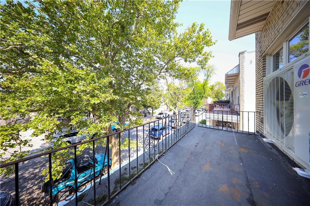 522 81 Street Brooklyn, NY 11209 - Photo 37 of 42 a view of a pathway of a house with a tree