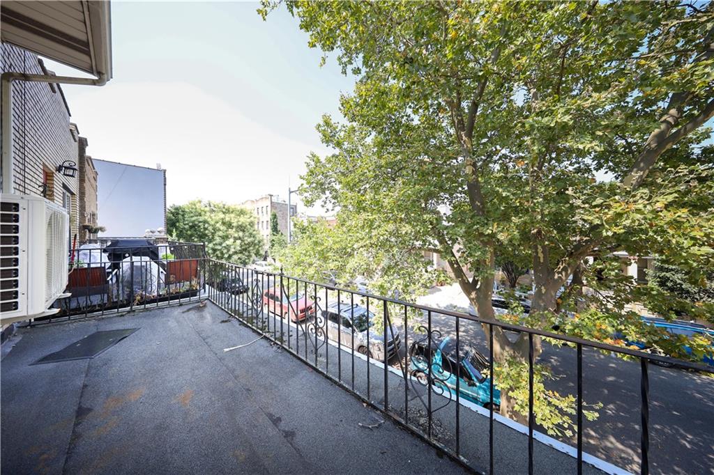 522 81 Street Brooklyn, NY 11209 - Photo 38 of 42 a view of a house with wooden fence