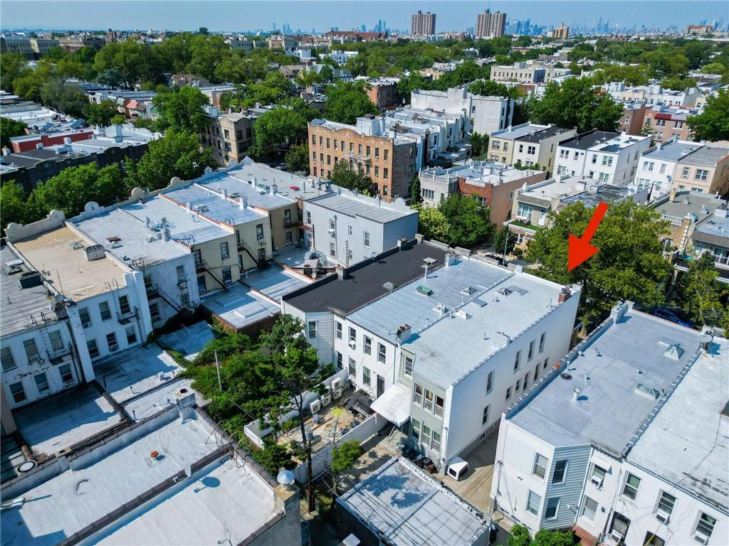 522 81 Street Brooklyn, NY 11209 - Photo 40 of 42 an aerial view of a house with a garden