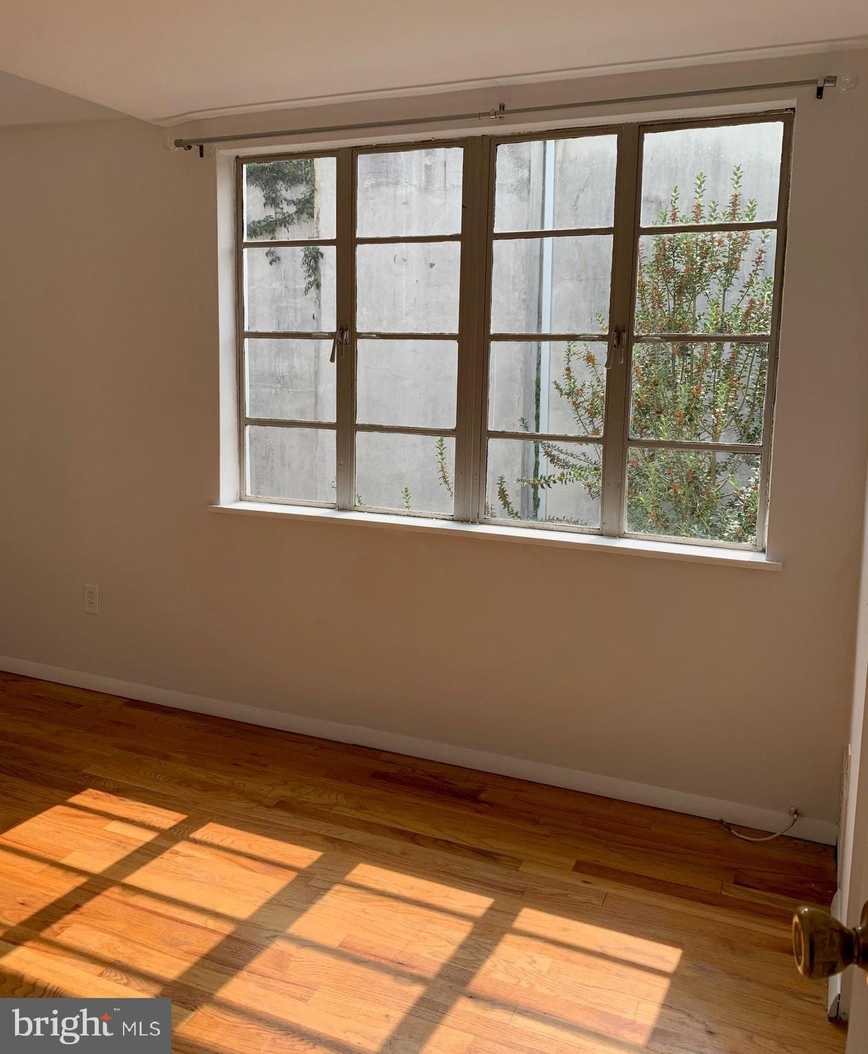 2018 Waverly Street Philadelphia, PA 19146 - Photo 15 of 22 a view of an empty room with a window