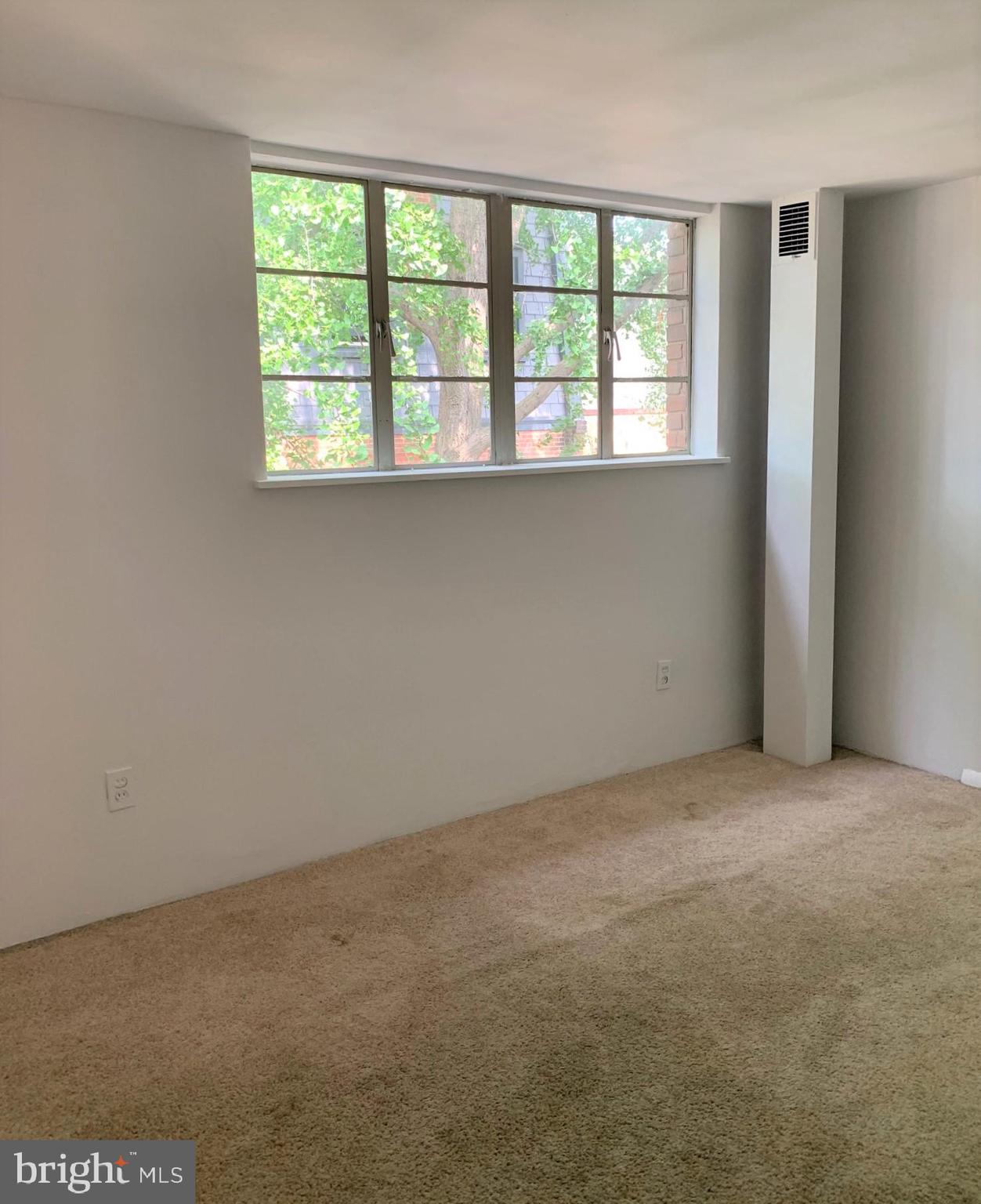 2018 Waverly Street Philadelphia, PA 19146 - Photo 17 of 22 an empty room with a window