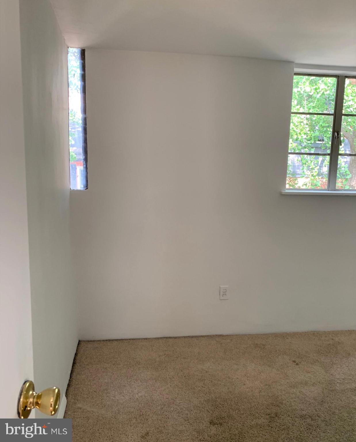 2018 Waverly Street Philadelphia, PA 19146 - Photo 18 of 22 an empty room with windows