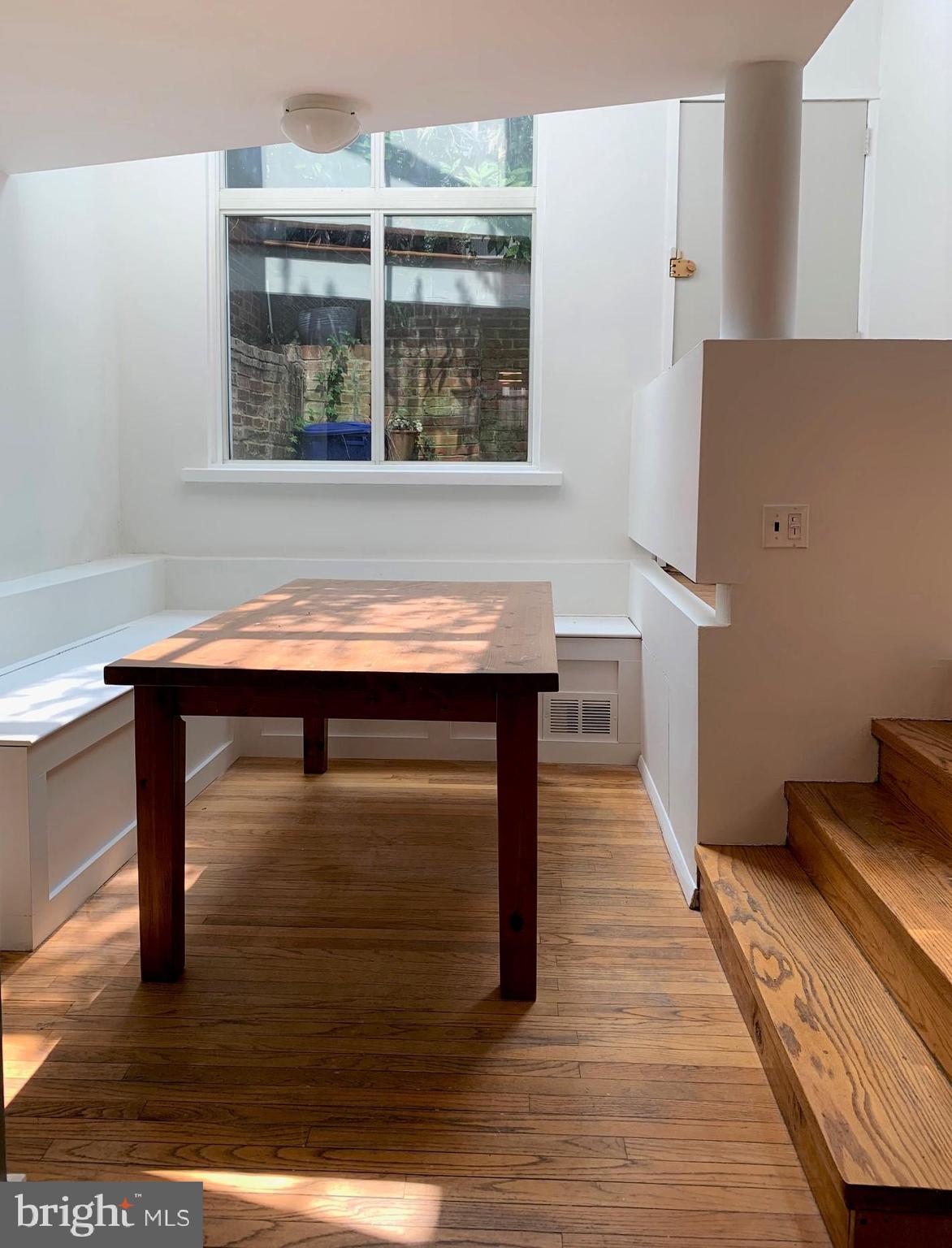 2018 Waverly Street Philadelphia, PA 19146 - Photo 5 of 22 a room with table and window