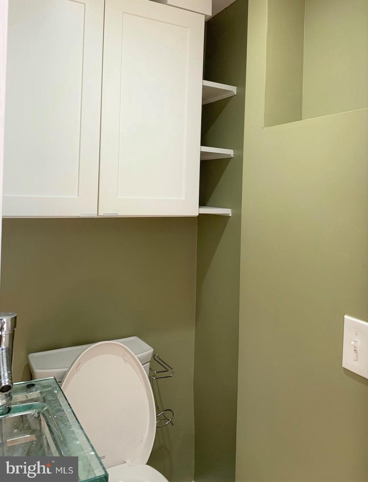 2018 Waverly Street Philadelphia, PA 19146 - Photo 6 of 22 a bathroom with a toilet and a sink
