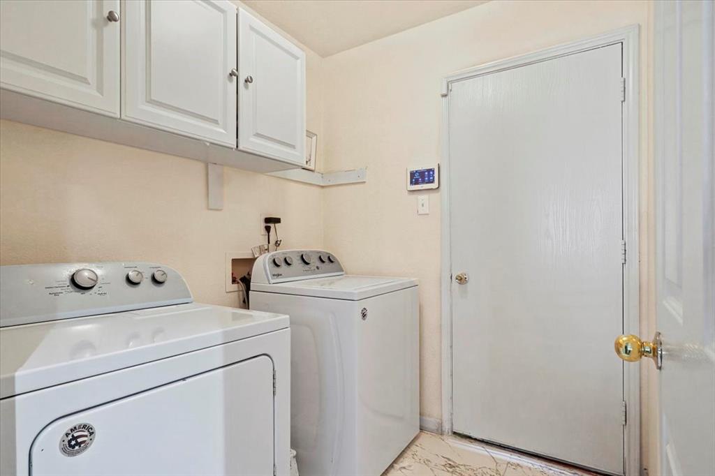 1412 Cheyenne Road Wylie, TX 75098 - Photo 17 of 24 a utility room with dryer and washer