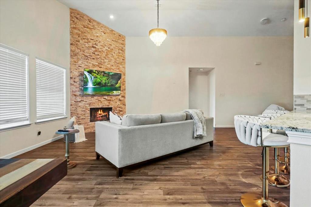 1412 Cheyenne Road Wylie, TX 75098 - Photo 5 of 24 a living room with furniture and a table