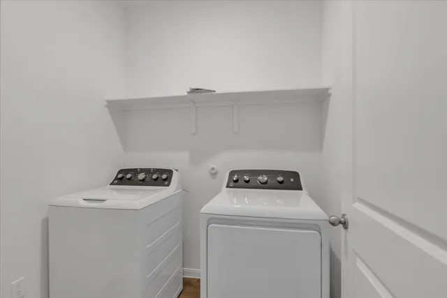 a utility room with dryer and washer