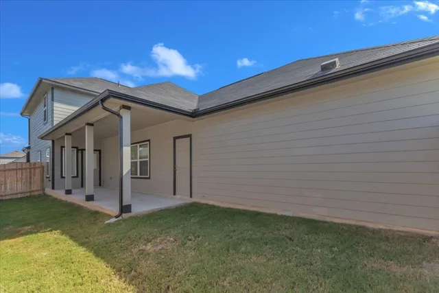 a view of a backyard with a garden