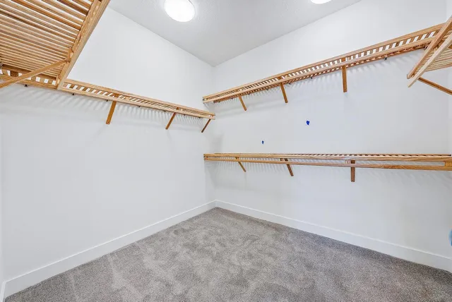 a view of a room with racks on the wall