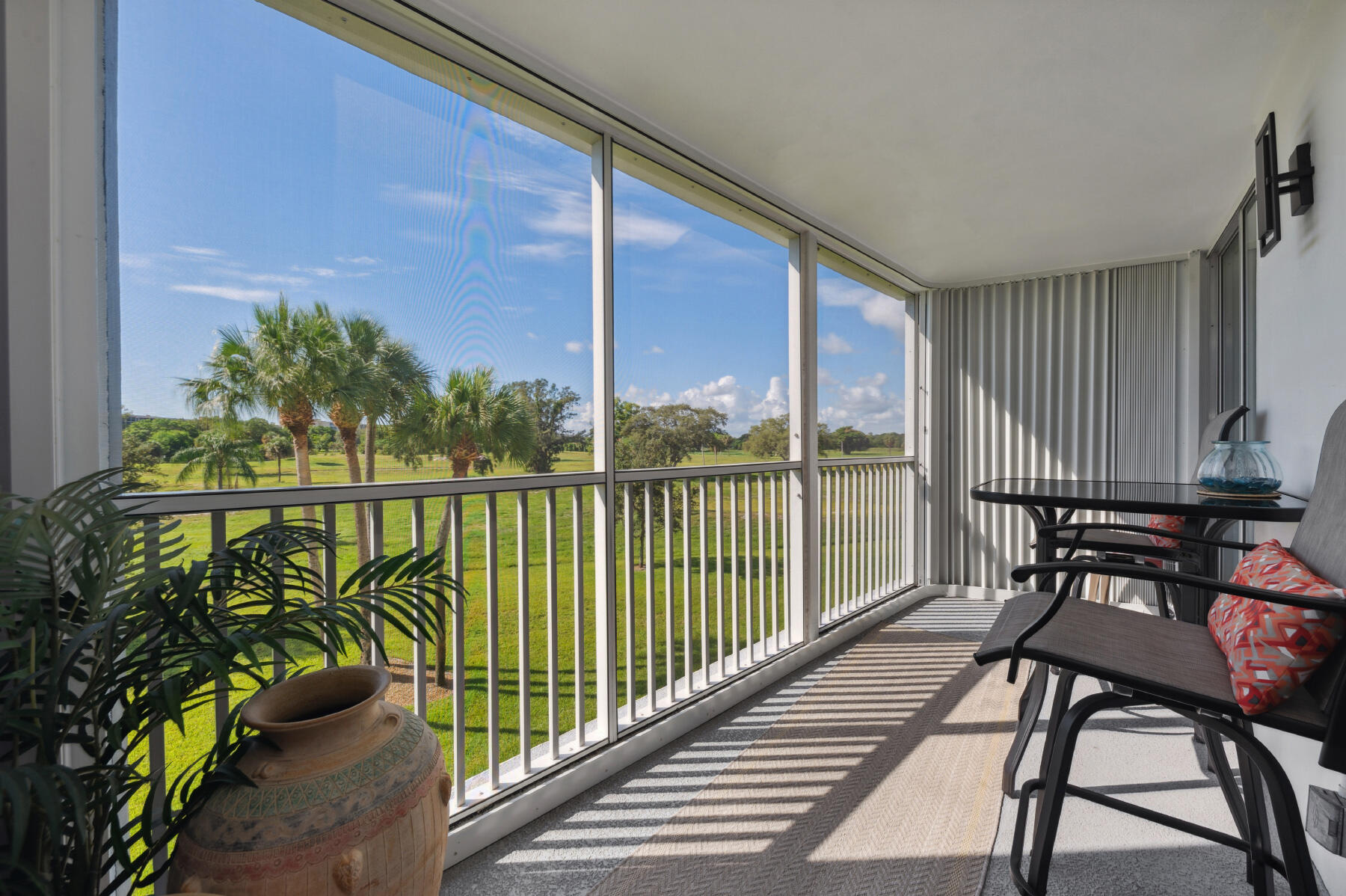 250 Northwest 67th Street, Unit 321 Boca Raton, FL 33487 - Photo 13 of 15 SCREENED PATIO