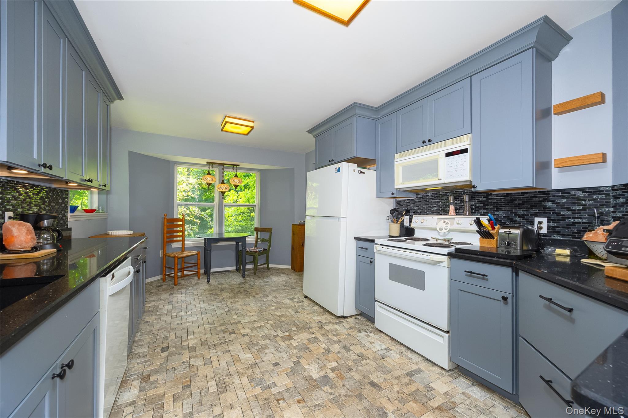 164 Bohl Road Hopewell Junction, NY 12533 - Photo 14 of 30 a kitchen with stainless steel appliances granite countertop a sink stove and refrigerator