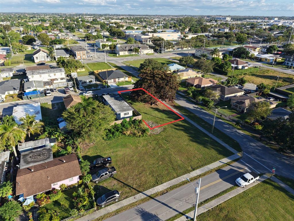 548 Southwest 6th Terrace Homestead, FL 33030 - Photo 6 of 13 an aerial view of residential houses with outdoor space