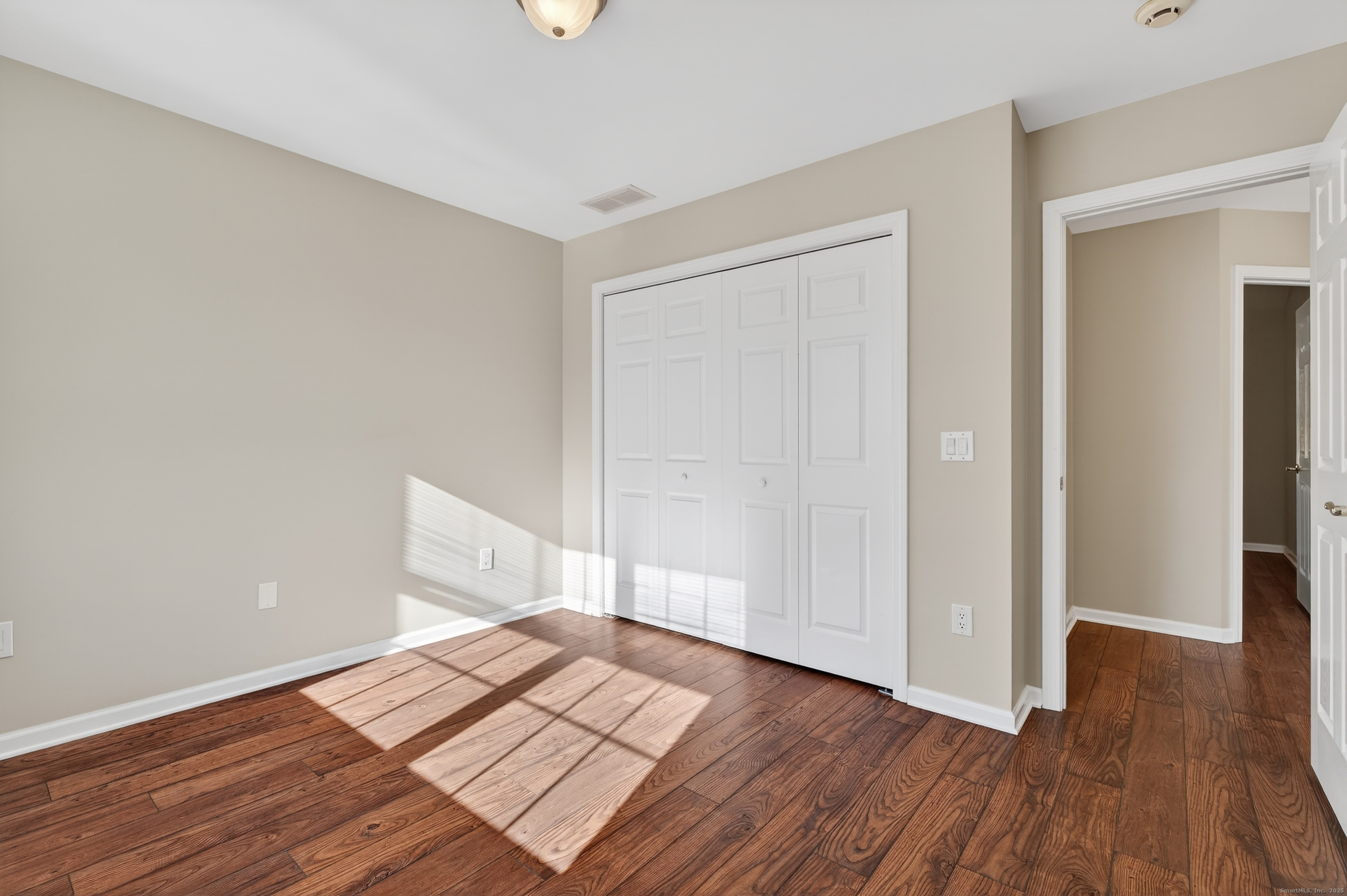 1902 Revere Road, Unit 1902 Danbury, CT 06811 - Photo 13 of 37 wooden floor in an empty room