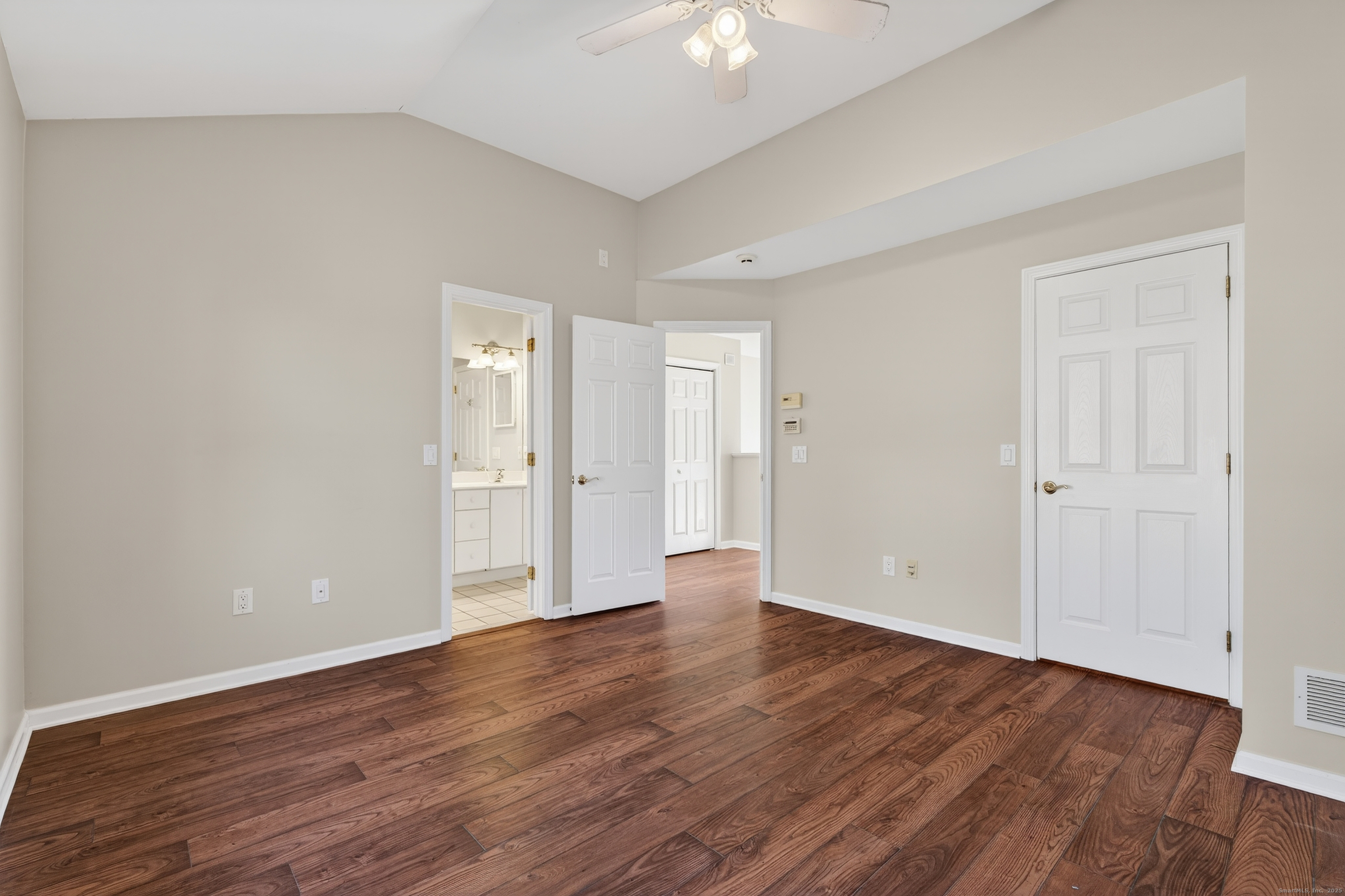 1902 Revere Road, Unit 1902 Danbury, CT 06811 - Photo 14 of 37 a view of an empty room with wooden floor
