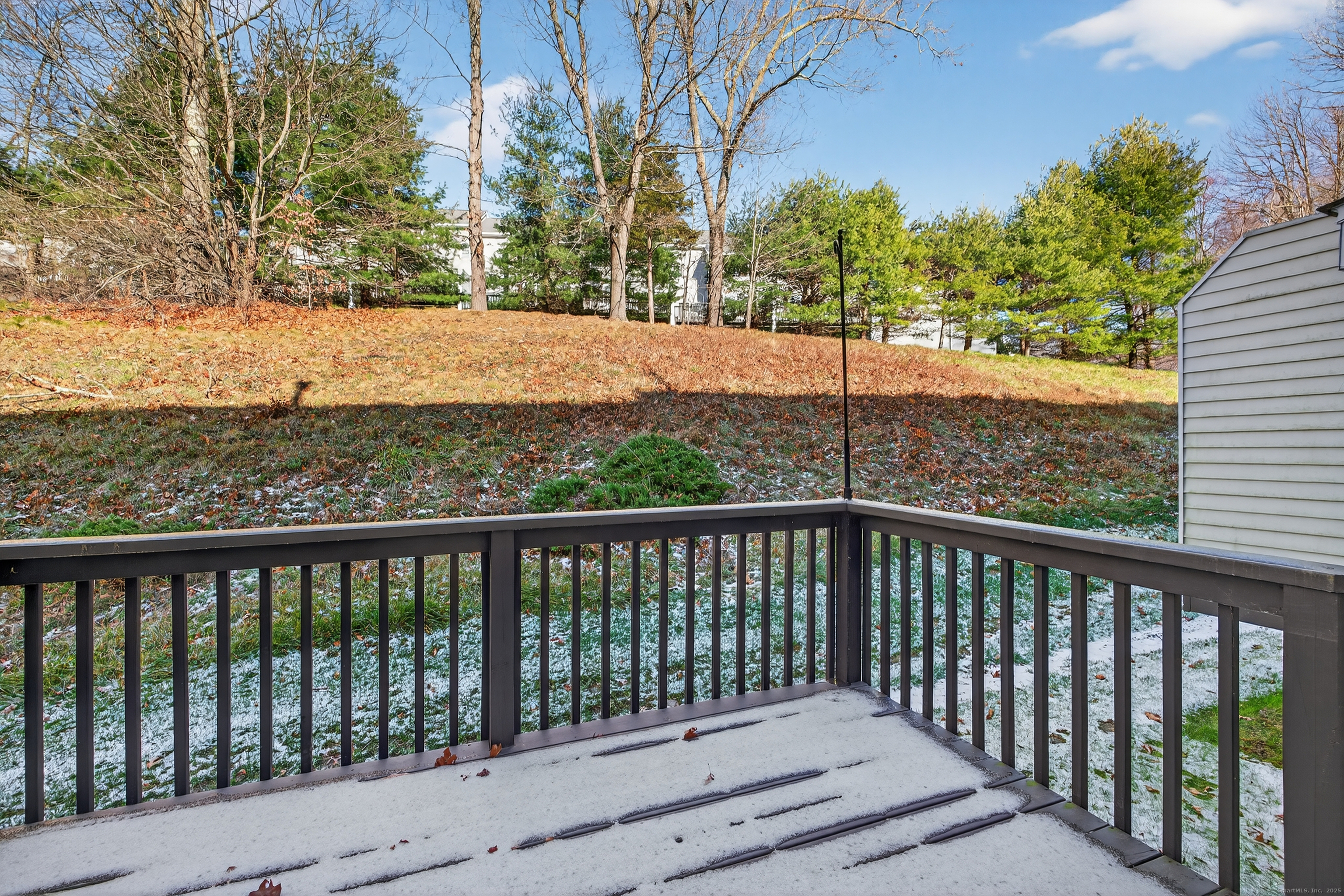1902 Revere Road, Unit 1902 Danbury, CT 06811 - Photo 34 of 37 a view of a wooden roof deck