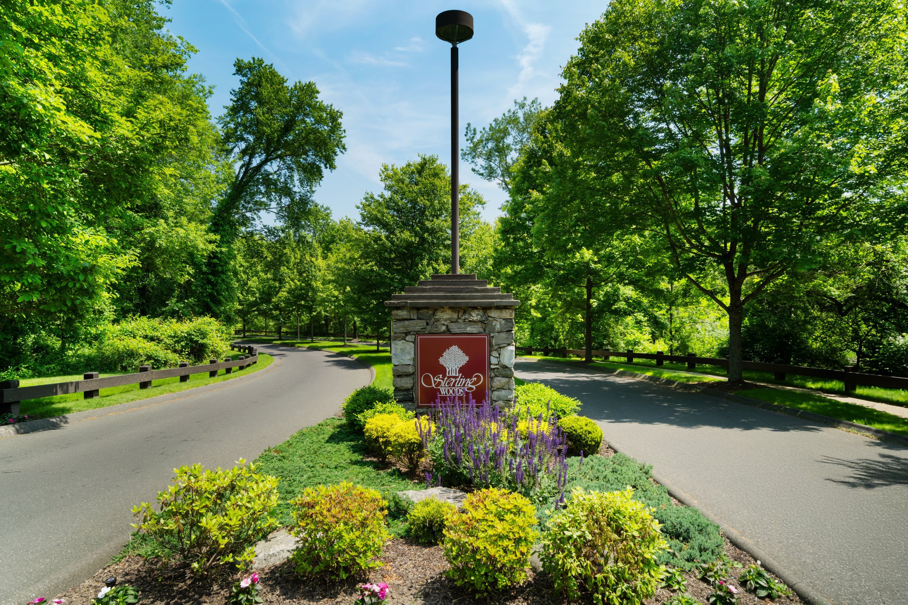 1902 Revere Road, Unit 1902 Danbury, CT 06811 - Photo 37 of 37 a front view of a house with garden