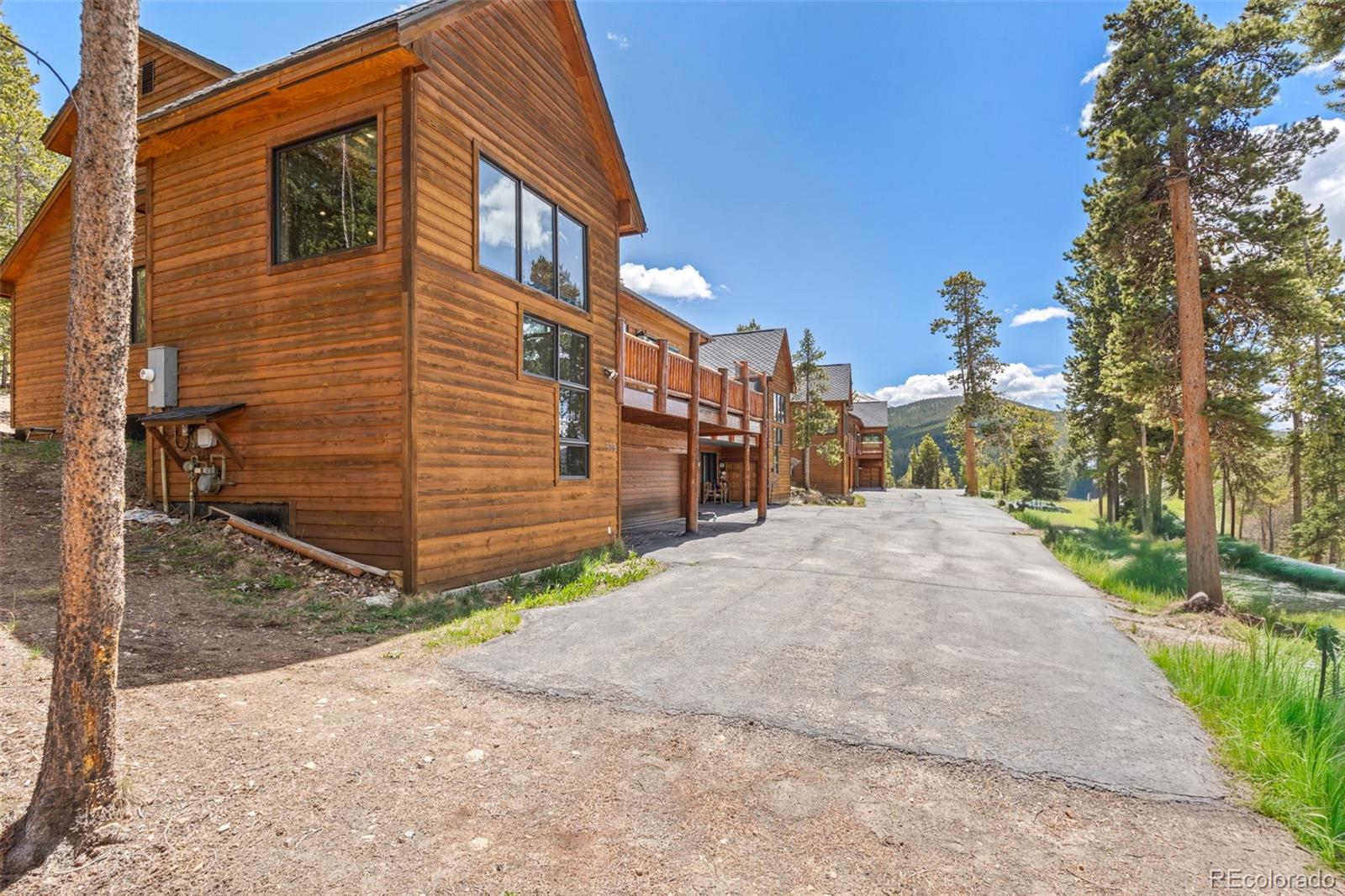 92 Emmett Lode Road, Unit B Breckenridge, CO 80424 - Photo 7 of 50 a pathway of a house with a yard