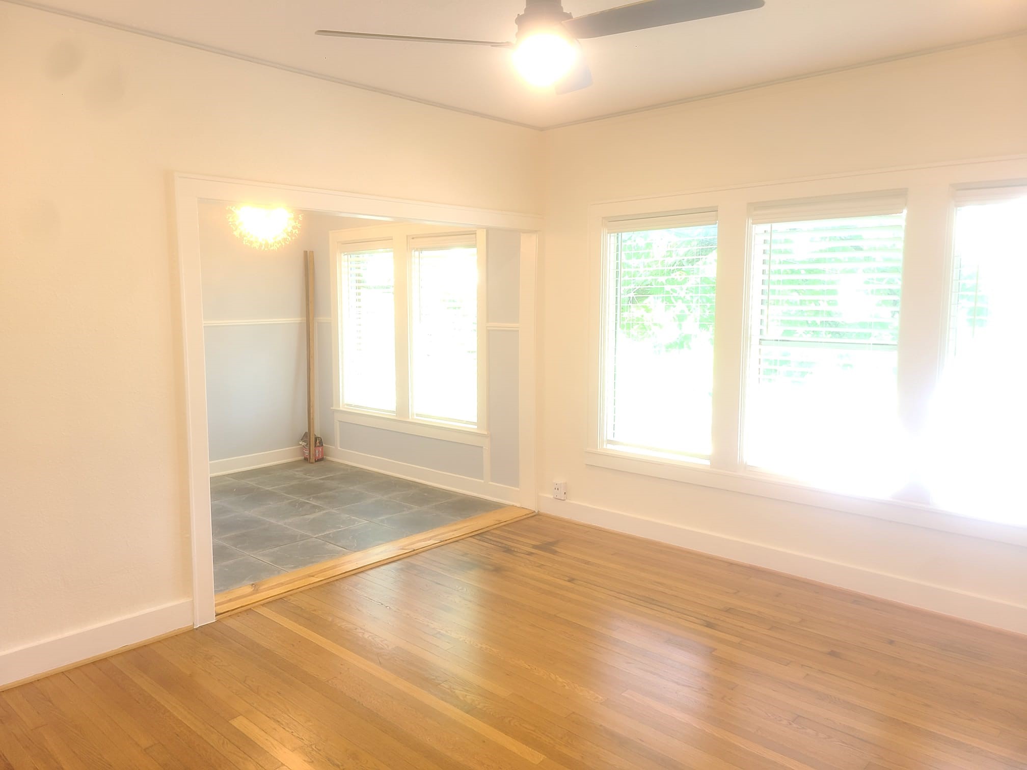 4703 Chenevert Street, Unit 2 Houston, TX 77004 - Photo 17 of 22 a view of empty room with wooden floor and fan
